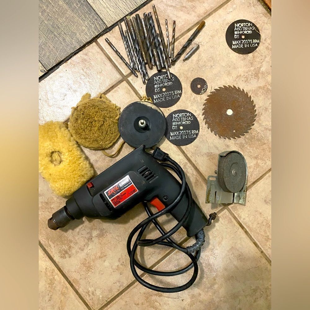 Skil hammer drill with bits, Chuck, grinder and blades